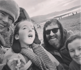 Amy and her family on the beach